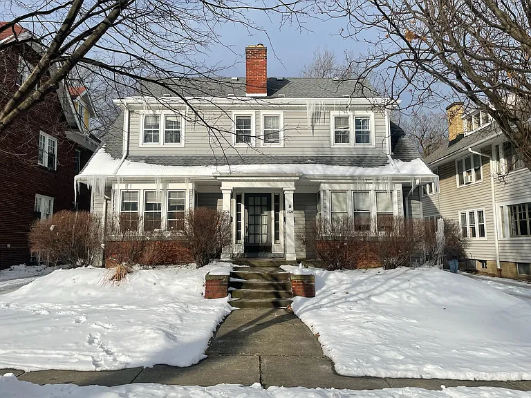 Streetview of the front of the house in winter