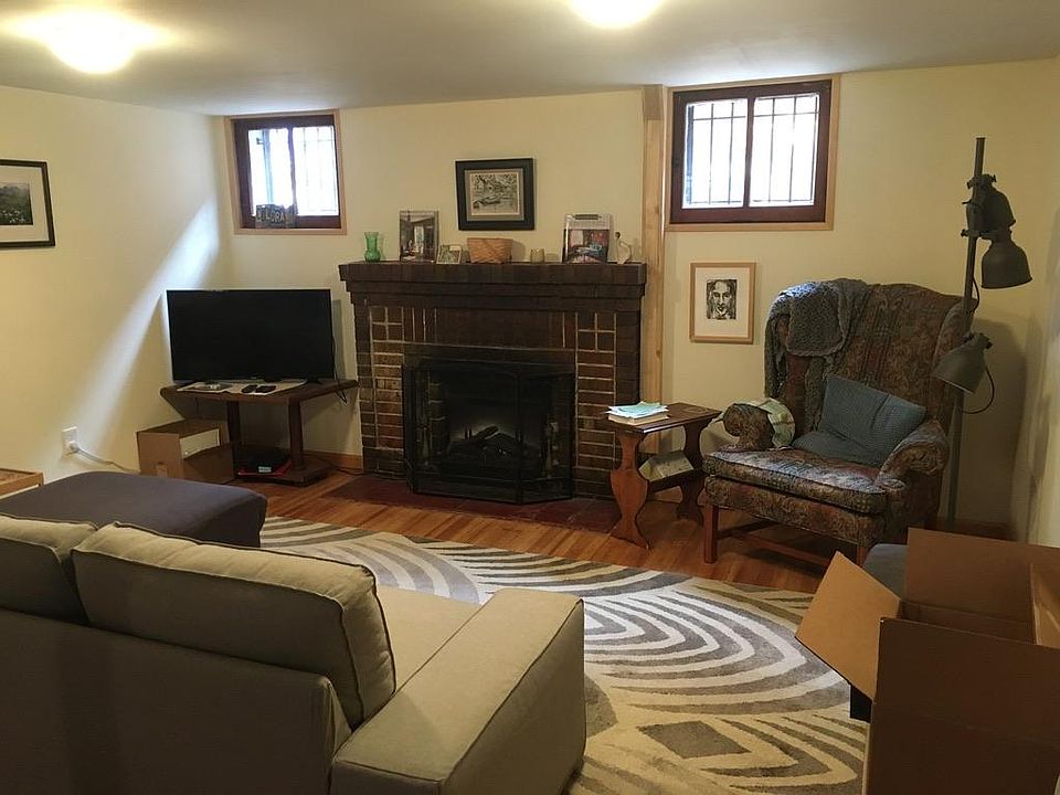 Large open living room, dining area and kitchen. Fully furnished. Electric fireplace insert with realistic flame. Smart TV. Garden level apartment with five 24"x24" windows and an legal egress window, 24"x 48" in bedroom. Private entrance. Eight steps d