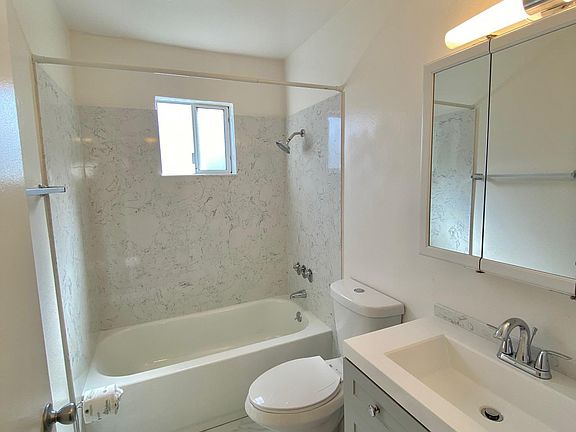 Luxury upgraded bathroom fixtures., custom tile floors cut on site. Soft lighting. Low flow toilet.