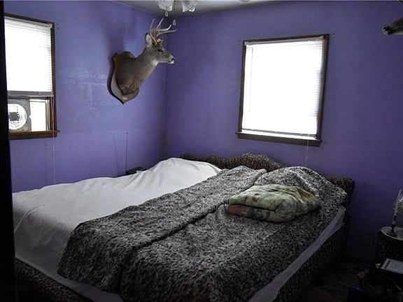 One of two bedrooms, plenty of natural light and closet space.