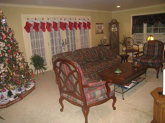 Large Formal Living Rm w/fabulous Brick fireplace and Rear Yard access