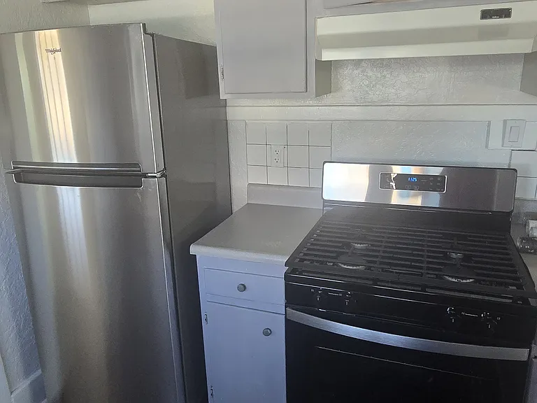 Brand new, never used appliances in the traditional kitchen.