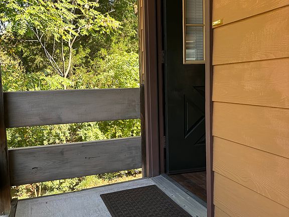 Front door; covered entrance.