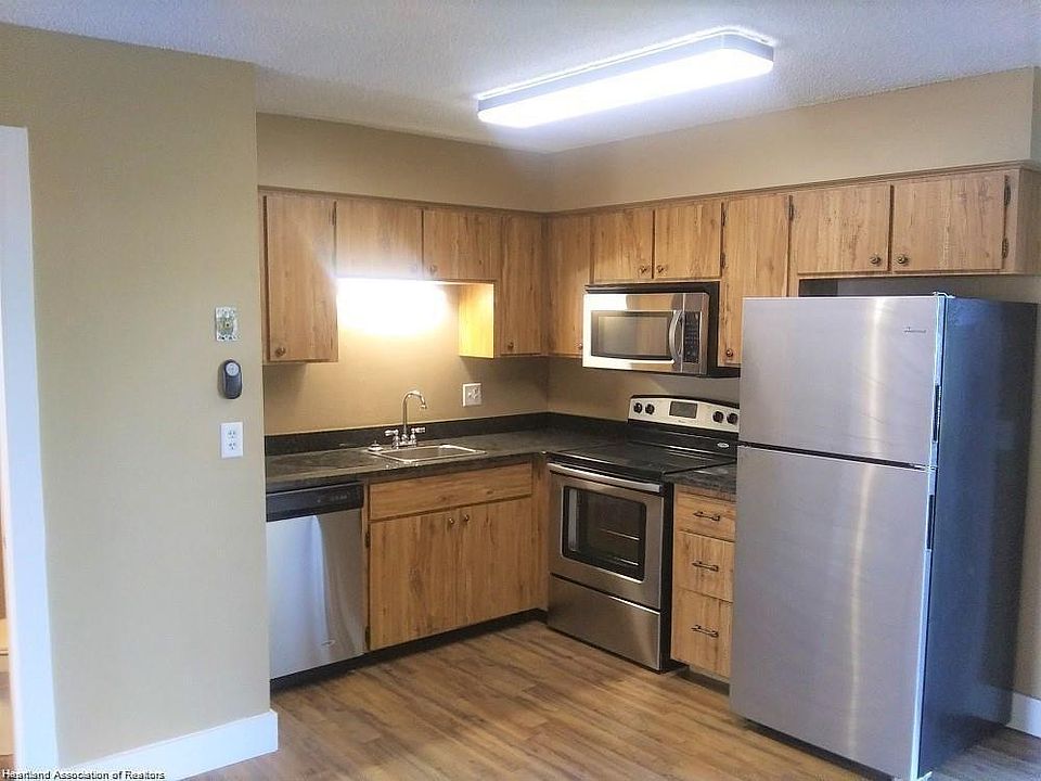 Kitchen with all stainless-steel appliances and granite countertops