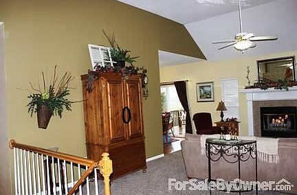Living Room from the front entry
						:
						14 Foot Ceilings, Fireplace, and open floor plan....very spacious.