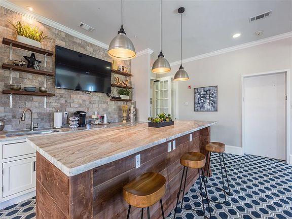 Newly Designed Resident Clubhouse with TVs, Kitchen, Lounge Seating and WiFi