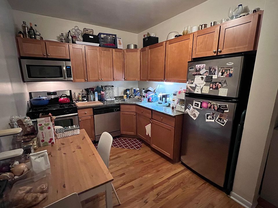Eat-in kitchen with new stainless steel appliances