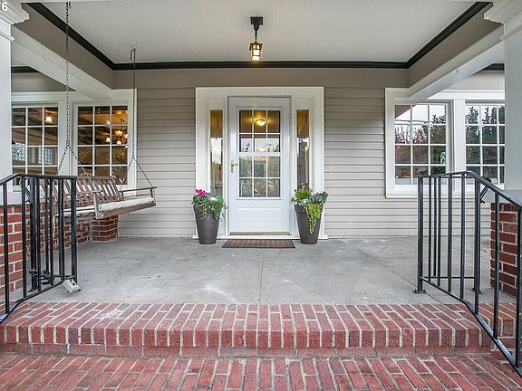 Covered porch with bench swing