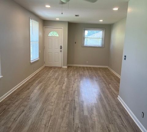 View from kitchen area into dining area and living room