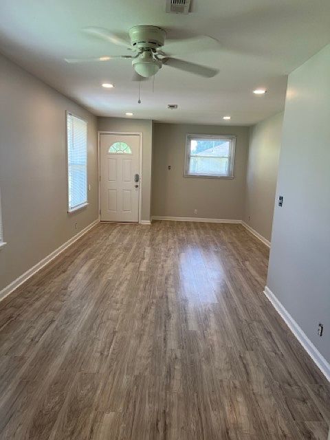 View from kitchen area into dining area and living room