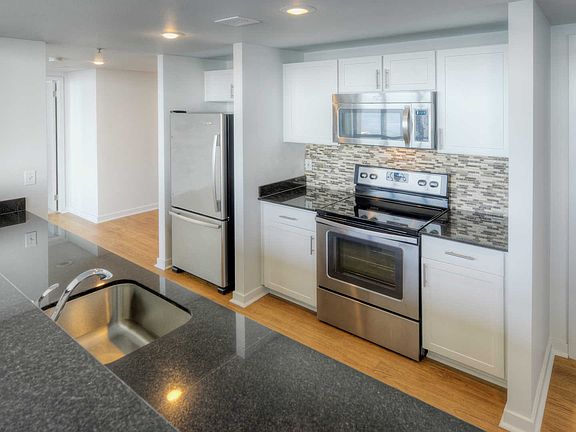 Kitchen with Stainless Steel Appliances and Granite Countertops