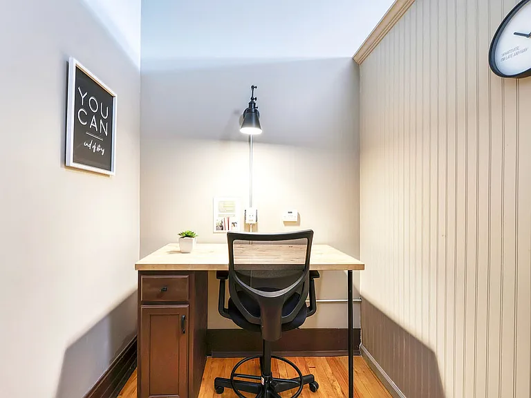 Cowoking space desk, chair lighting and decor one desk space