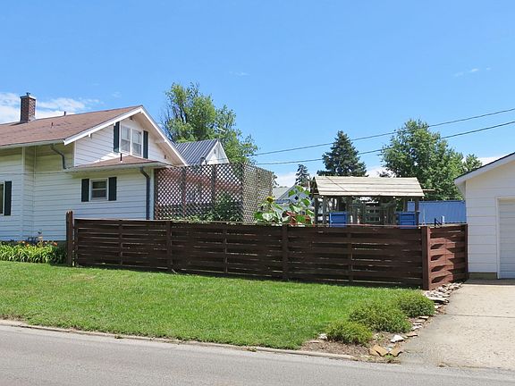 Detached garage (note--fence has been updated/replaced; playset not included)