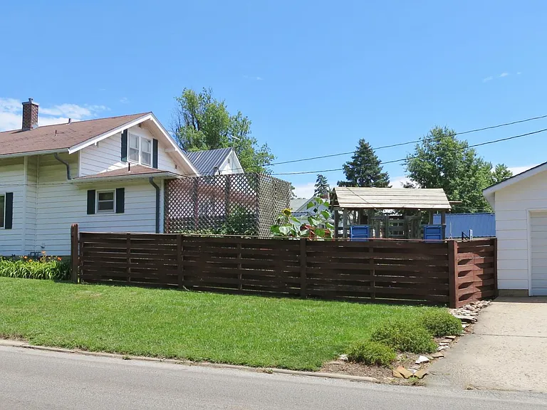 Detached garage (note--fence has been updated/replaced; playset not included)