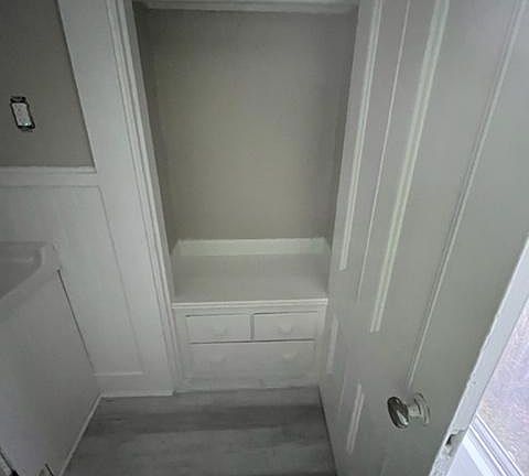 Historic built- in storage/ bar/ drawers in bathroom closet