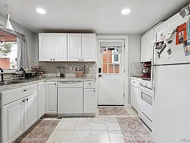 Kitchen with side door.