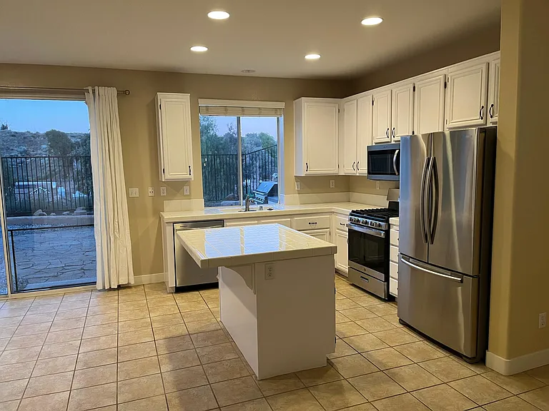 Beautiful, bright kitchen with stainless steel appliances