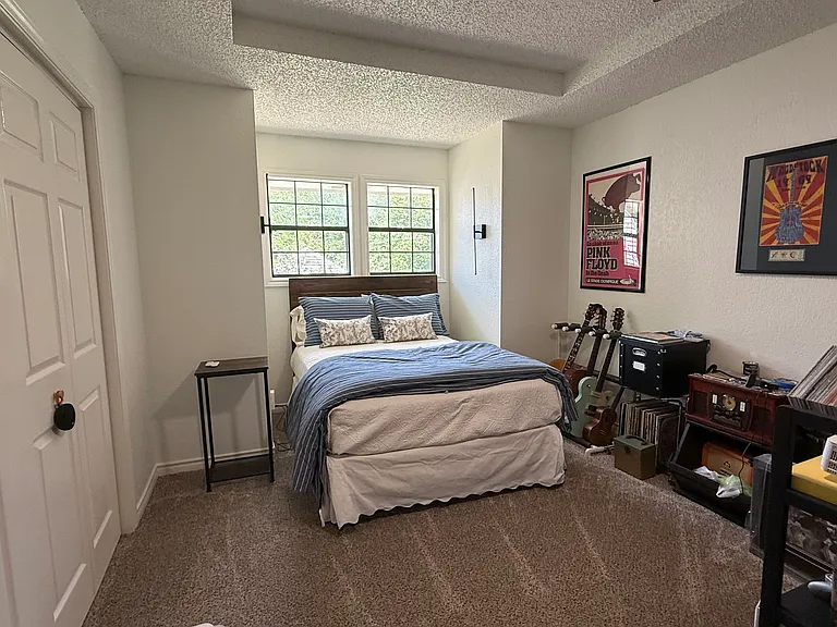 One of the three upstairs bedrooms. With furniture to show scale.