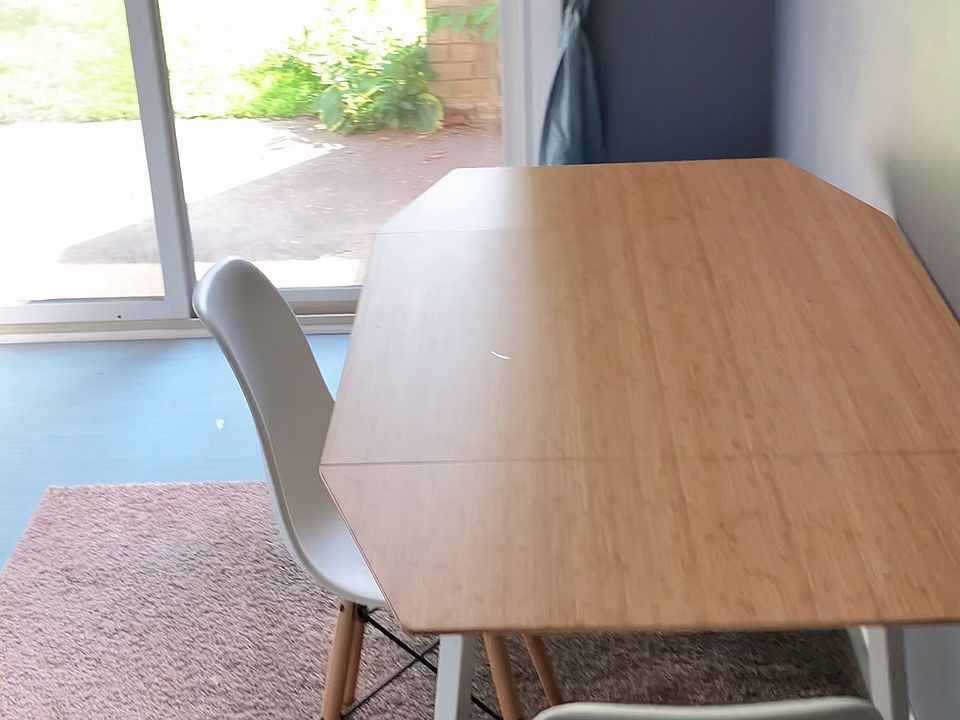 Bright kitchen looking out onto the shared outdoor space.