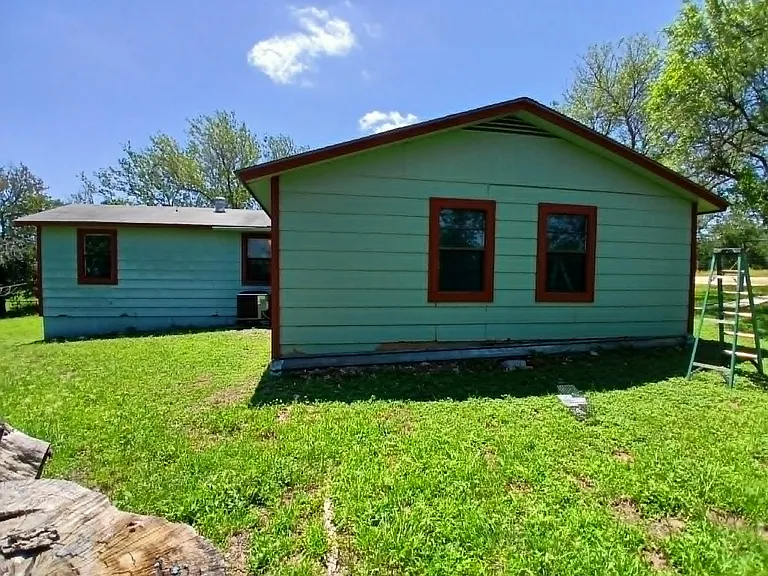 Side and back of house (central A/C)