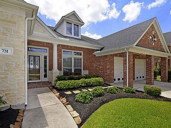 All brick and stone on front with nice front porch to greet your friends and family to your new home