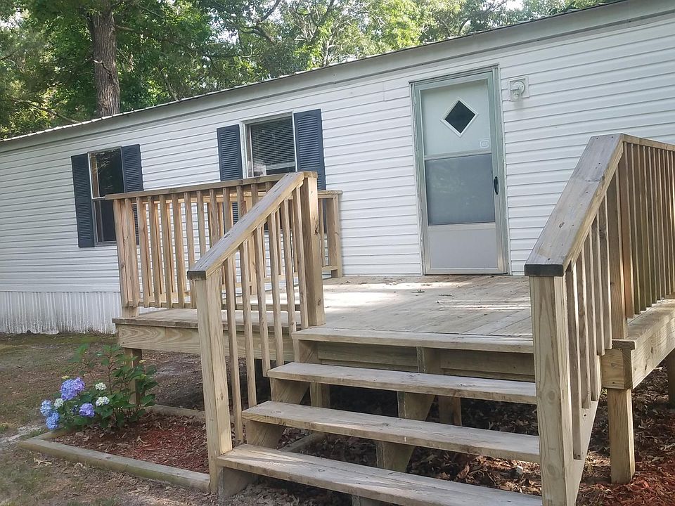 Front of home with deck 