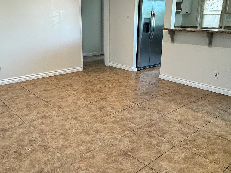 living room next to kitchen