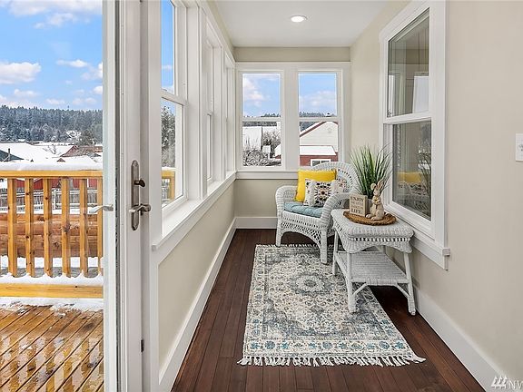 The fully enclosed sunroom is a delight on both winter and summer days. It provides direct access from the back deck and would most logically become the primary entry point to the home. Plenty of room for shoes and boots, coats, etc.