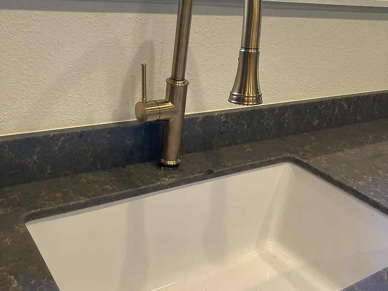 Rohl fireclay sink and Aquabrass faucet