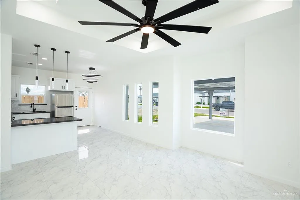 Building Photo - 1408 S Xanthia St #3