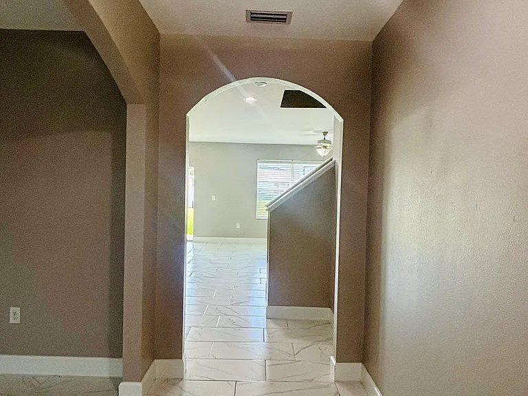 Front entrance. To the left is formal dinning room