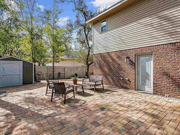 Large storage shed in back