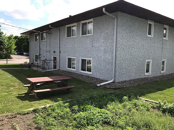 Picnic in the summertime. We have outdoor lawn that includes a picnic table and a garden plot!