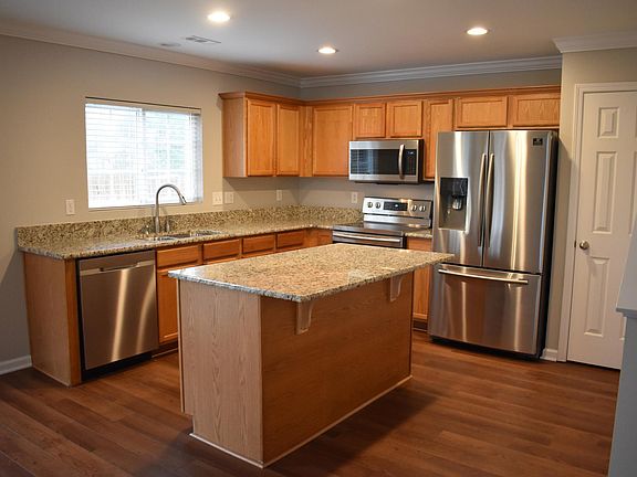 Updated kitchen with oversized island, Granite and all new Stainless Steel Appliances