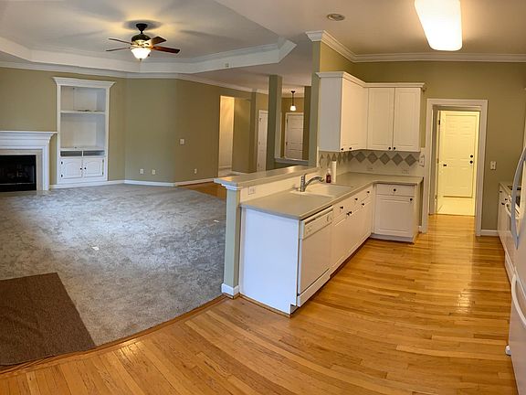 Spacious open floor plan with bright, sunny kitchen.