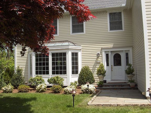 Stainglass front door and bay window