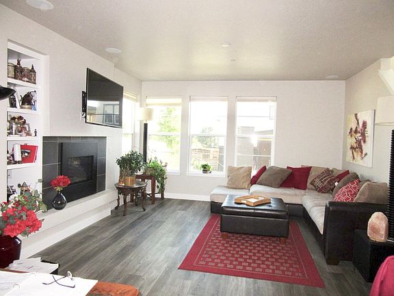 Open floor plan with private foyer, Great Room (with gas fireplace), dining area and kitchen