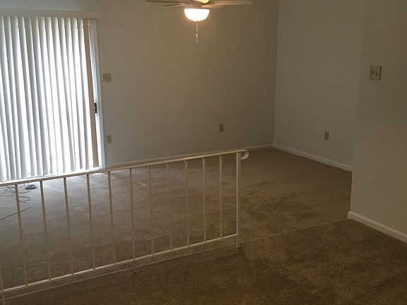 Dining room into living room from interior hall