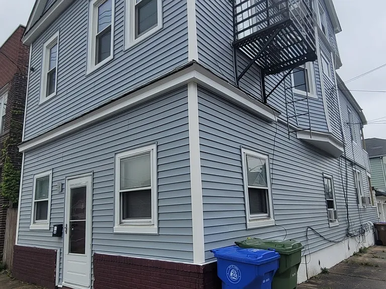 Full view of the front and side of the house.