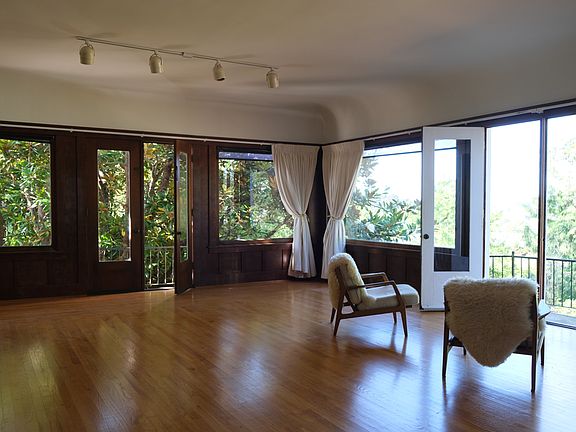 The Ballroom is beautiful with its large windows and 2 sets of doors to open to the magnolia tree and overlooking the Arcata bay.