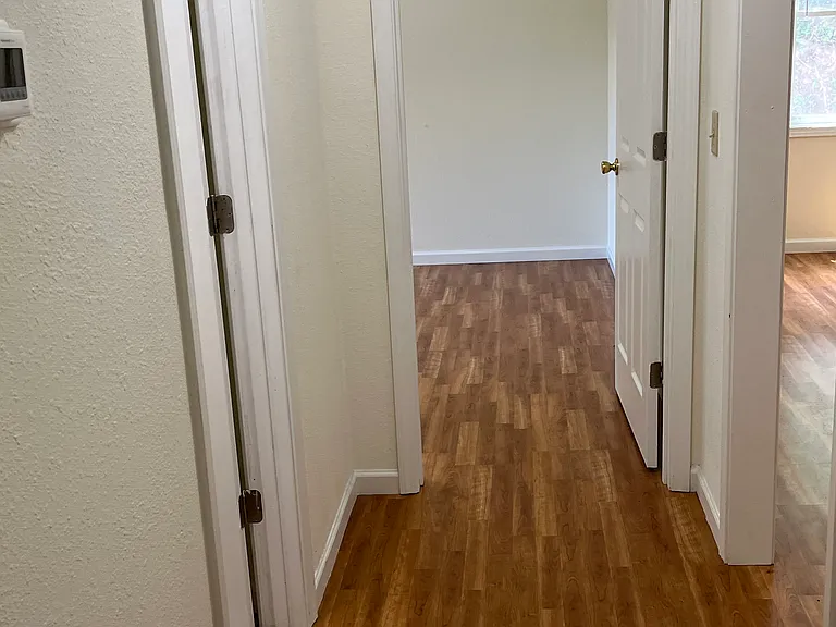 Hall between bedrooms - full bath in between bedrooms