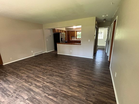 Living room with LVP flooring.