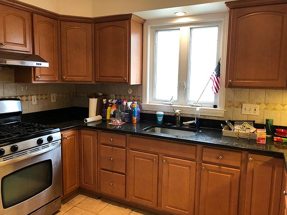 kitchen with granite sinks, lots of storage