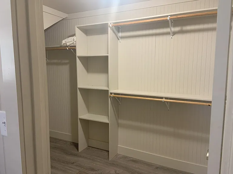 A lot of closet hanging space and shelving space too