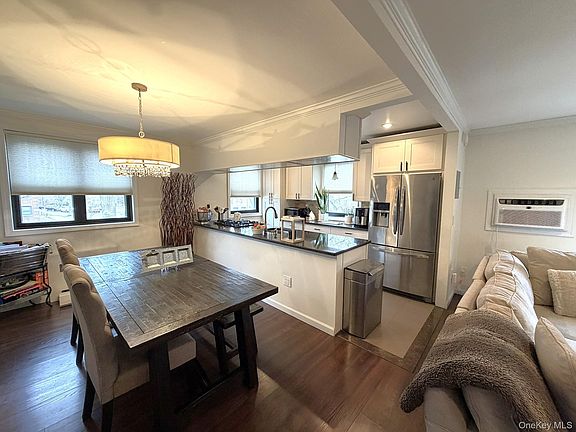 5th image of 245-17 62nd Avenue #Upper