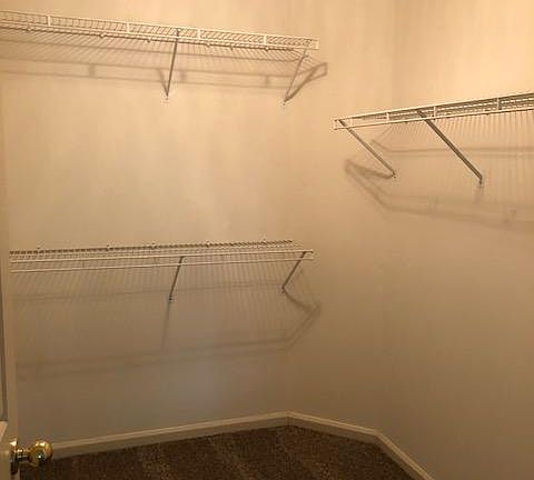 Extra large walk-in closet in the master bedroom.