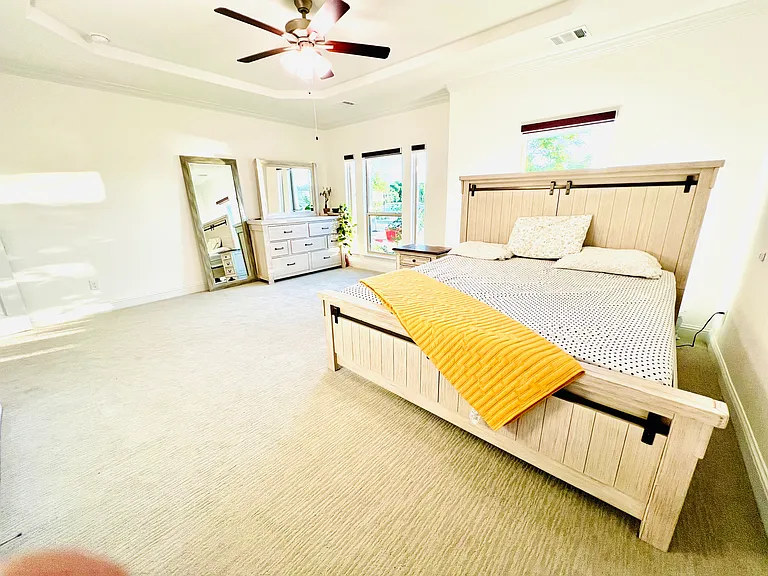 Master bedroom with a stunning lake view