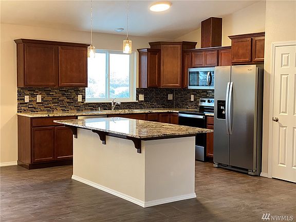 Kitchen view from living room. Picture as of 01/14/2020