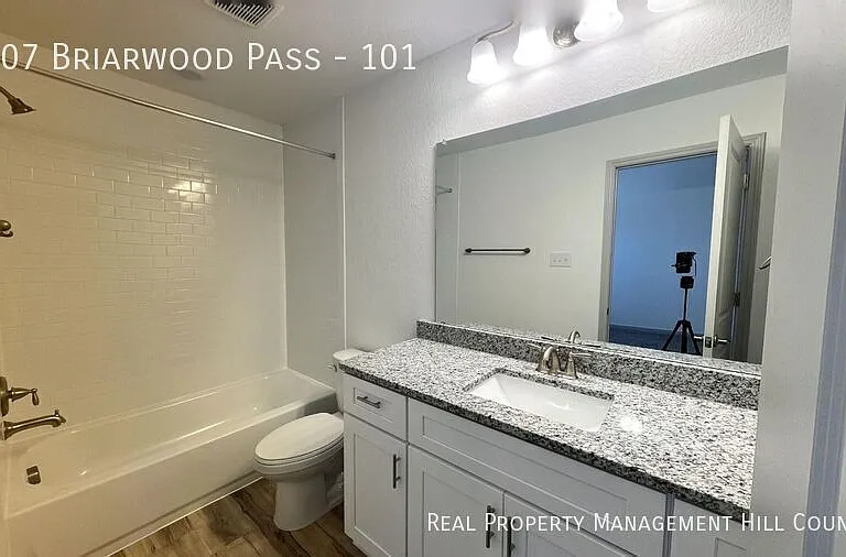 7707 Briarwood Pass #101 — Photo 19