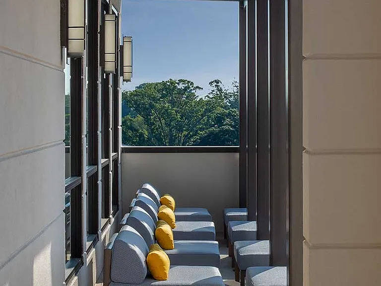 Covered lounge seating on balcony